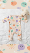 Sunbeam Peach patterned onesie